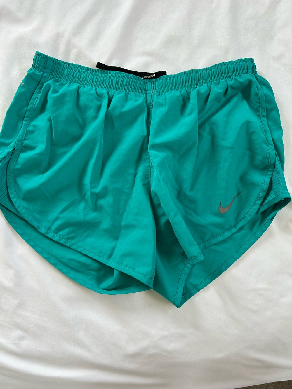 Nike Women's Teal Athletic Shorts with Reflective Swoosh
